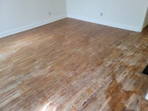 refinished hardwood flooring before TC Carpet Care